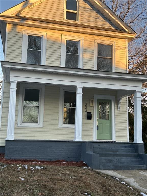 view of front of home featuring covered porch