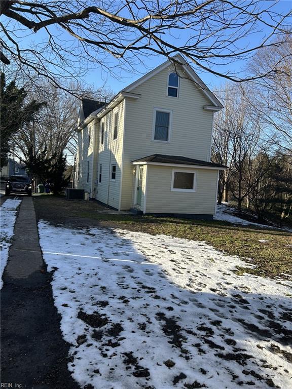 view of snow covered property