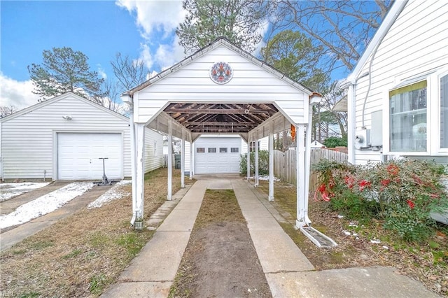 exterior space featuring a carport and a garage