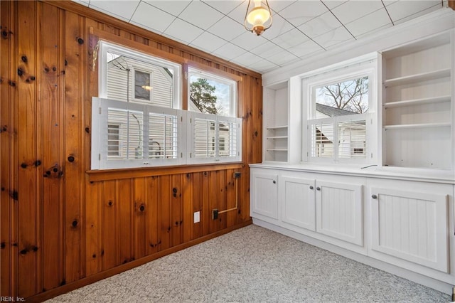 unfurnished sunroom with plenty of natural light