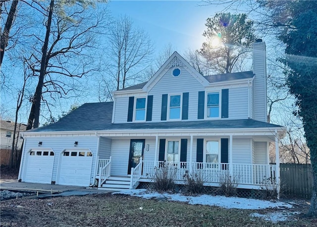 view of front facade featuring a garage and covered porch