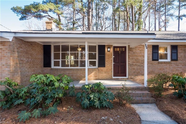 doorway to property with a porch