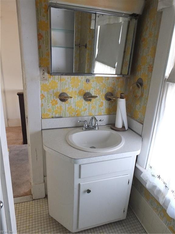 bathroom featuring tile patterned floors and vanity