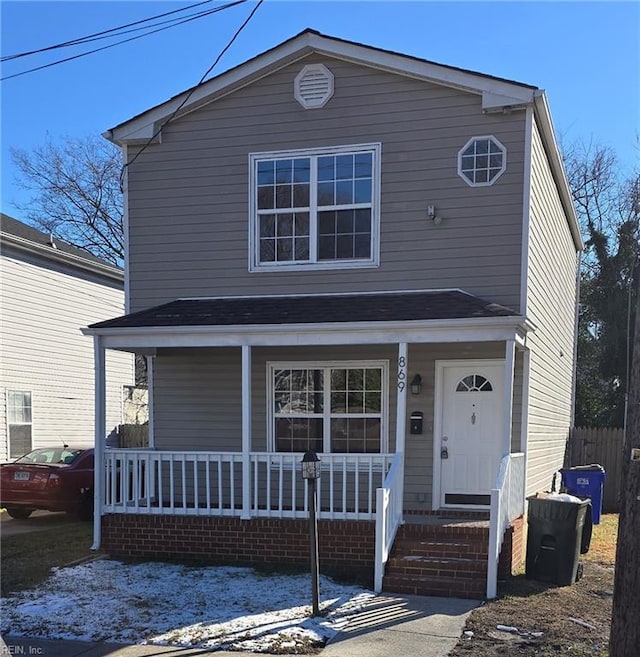 view of property with covered porch