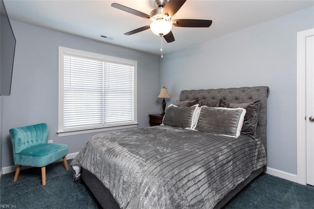 carpeted bedroom featuring ceiling fan