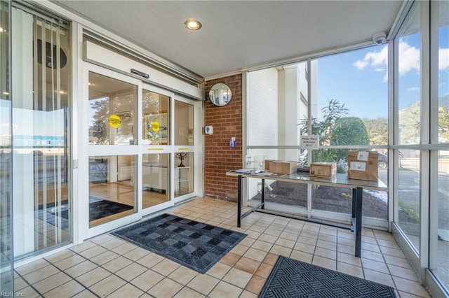 sunroom / solarium with a healthy amount of sunlight