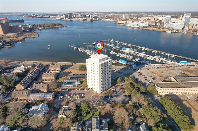 birds eye view of property with a water view