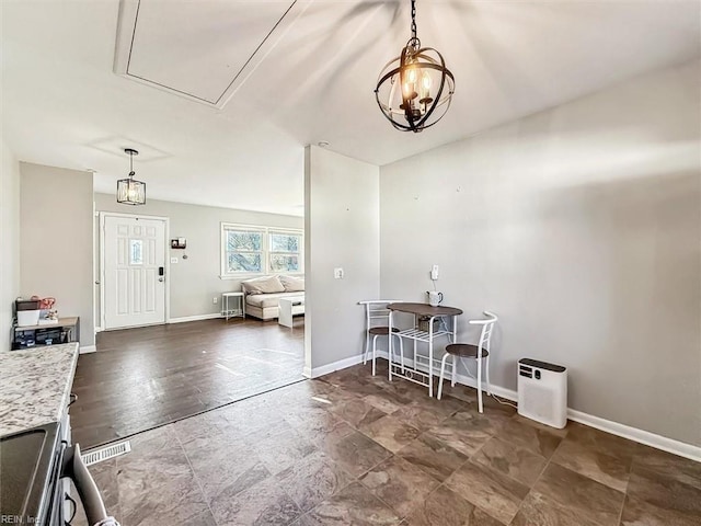 dining room with a chandelier