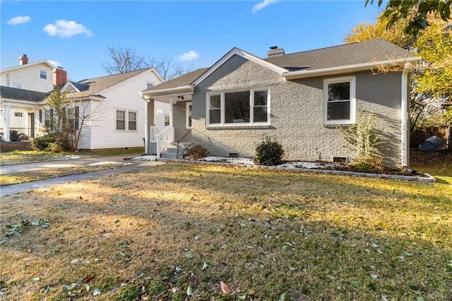 view of front facade with a front yard