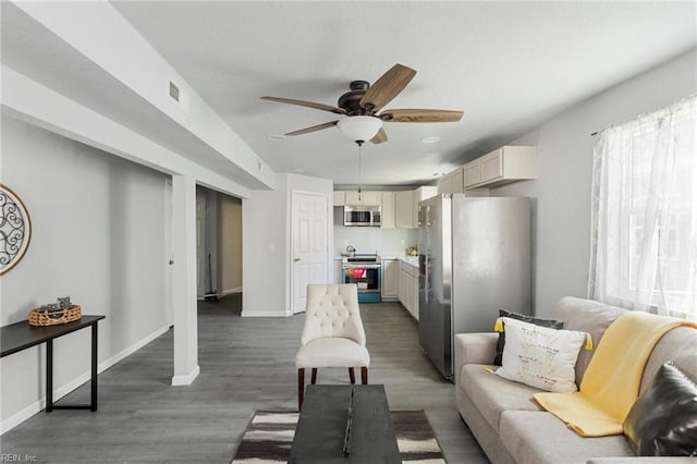 living room with dark hardwood / wood-style floors and ceiling fan