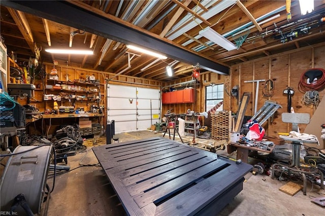 garage with a workshop area