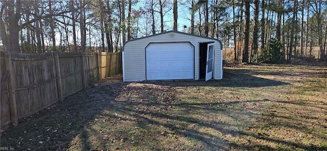 garage with a yard