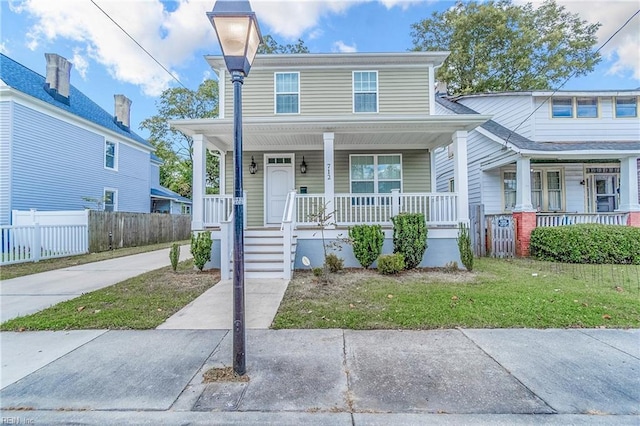 view of front of property with a front lawn and a porch