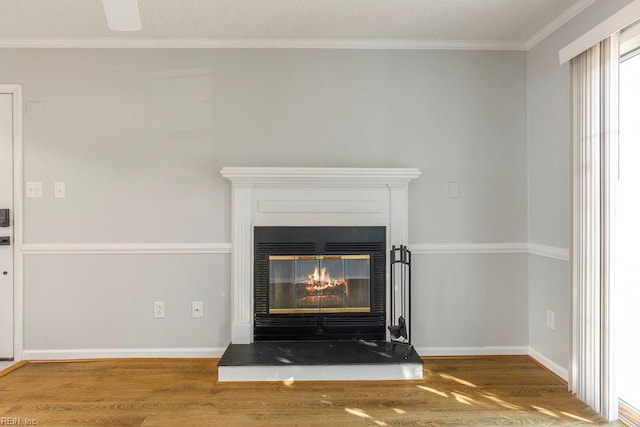 room details with hardwood / wood-style floors and crown molding