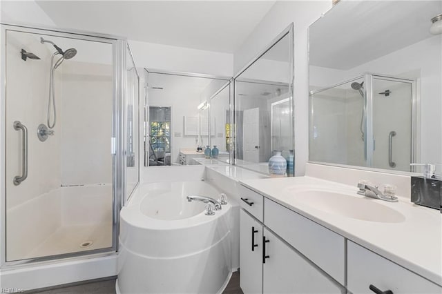 bathroom with vanity and plus walk in shower