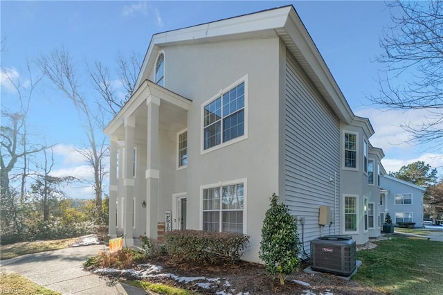 view of home's exterior featuring central AC