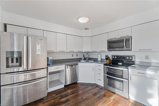 kitchen with white cabinets, sink, and stainless steel appliances