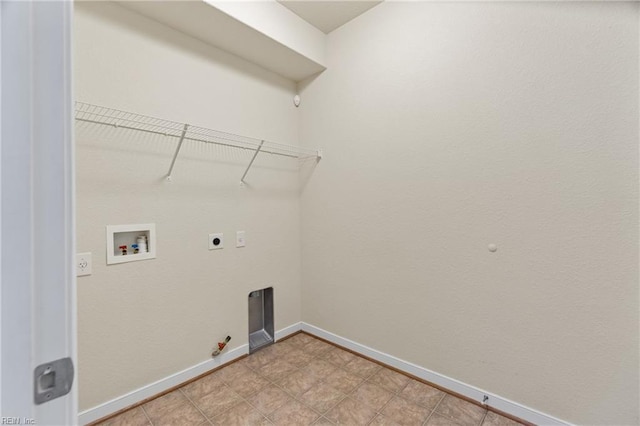 laundry area featuring electric dryer hookup, hookup for a washing machine, and hookup for a gas dryer