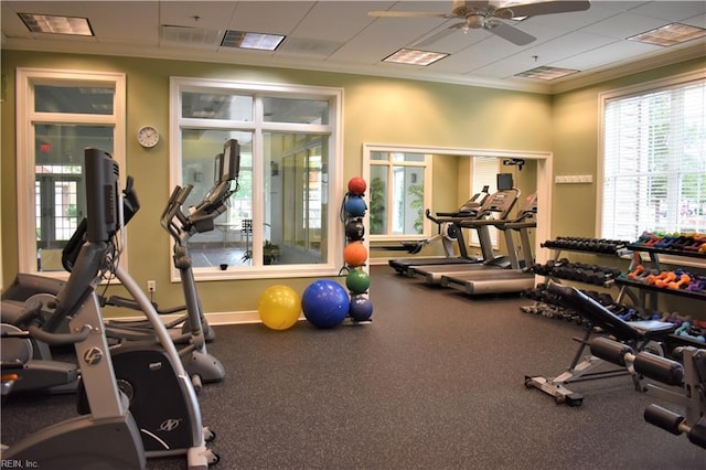 gym featuring french doors, ceiling fan, and crown molding