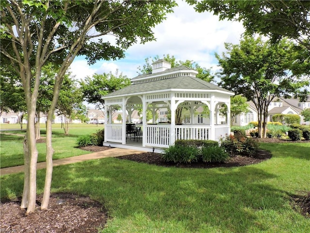 surrounding community featuring a lawn and a gazebo