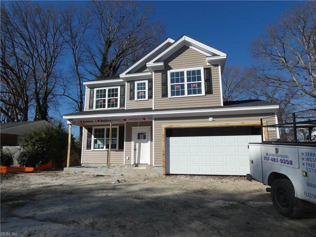 view of front of property with a garage and a porch