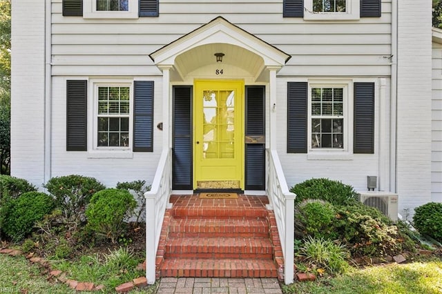 property entrance featuring ac unit