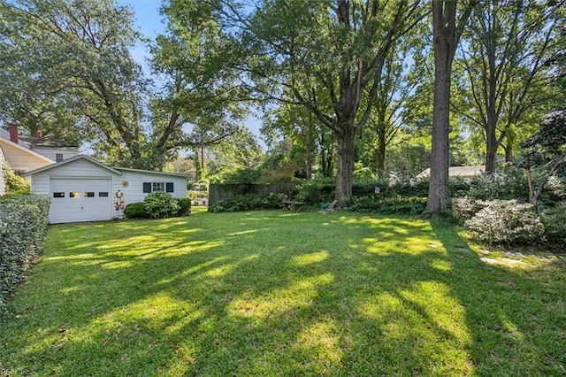 view of yard featuring a garage