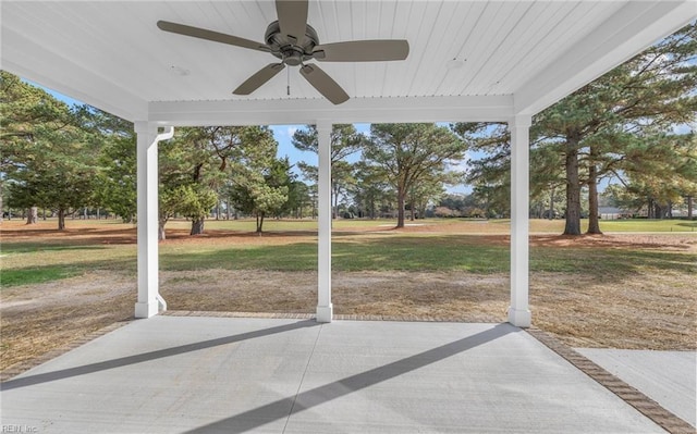 exterior space featuring ceiling fan