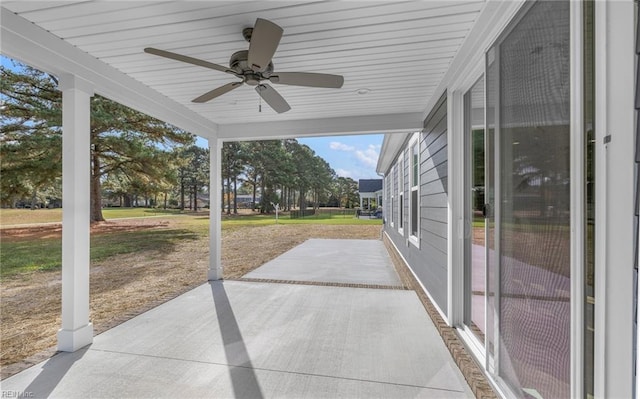 sunroom / solarium with ceiling fan