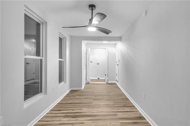 corridor featuring light hardwood / wood-style flooring