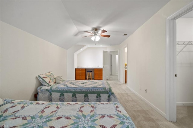 carpeted bedroom featuring ceiling fan and lofted ceiling