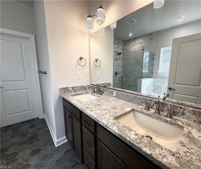 bathroom featuring walk in shower and vanity