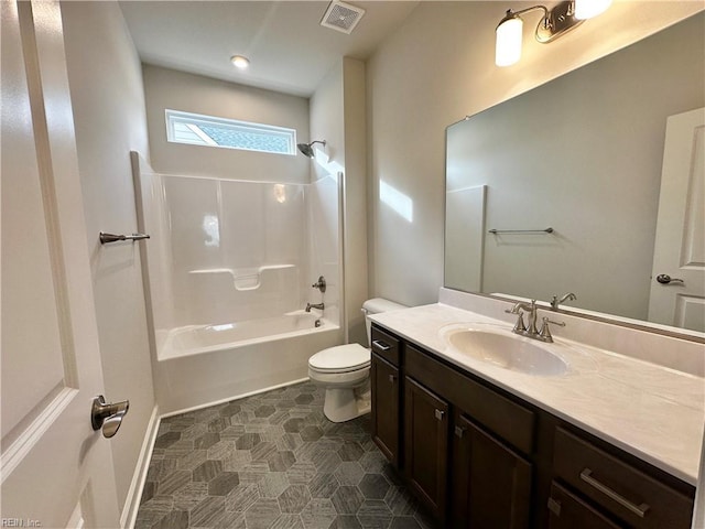 full bathroom featuring toilet, vanity, and washtub / shower combination