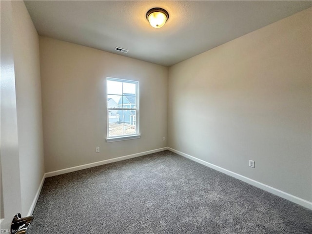 empty room featuring carpet