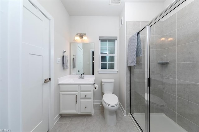 bathroom with walk in shower, vanity, toilet, and tile patterned flooring