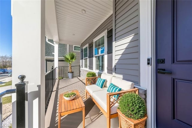 balcony featuring covered porch