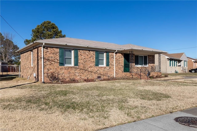 ranch-style house featuring a front yard