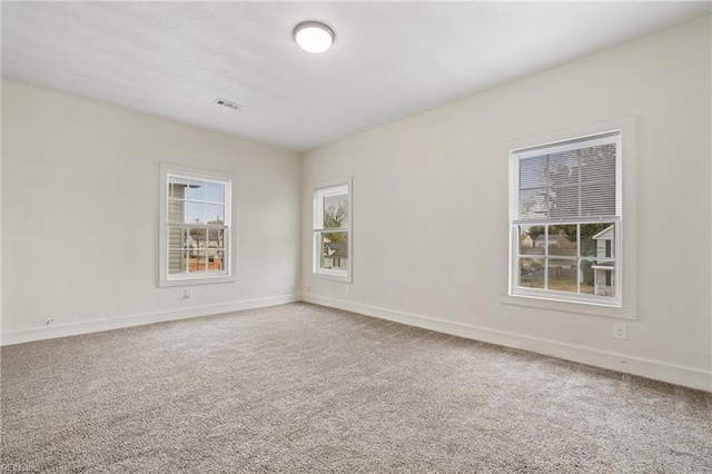 view of carpeted spare room