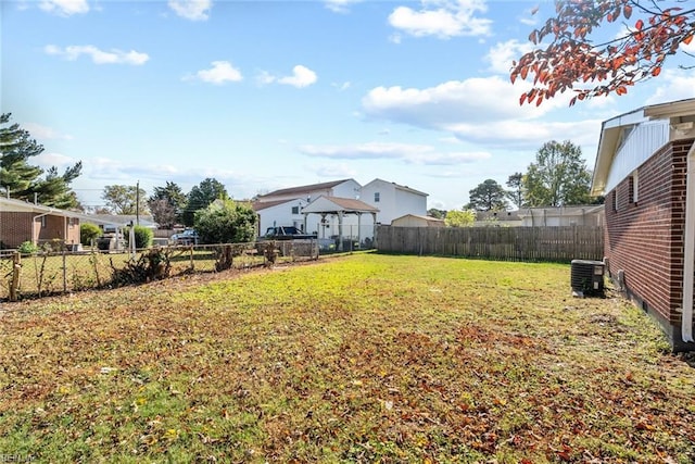 view of yard featuring central AC unit