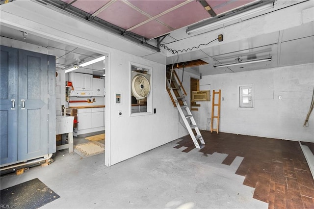 basement featuring an AC wall unit