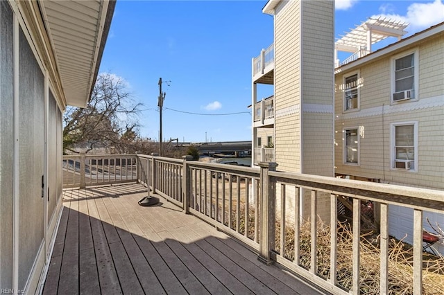 wooden deck with a pergola