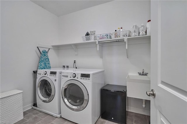 washroom featuring separate washer and dryer