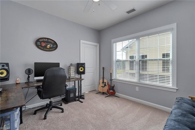 office featuring light colored carpet and ceiling fan