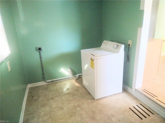 washroom featuring washer / clothes dryer