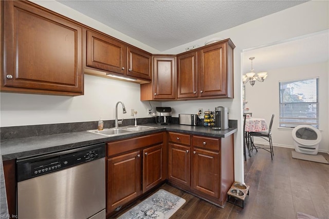 kitchen with a notable chandelier, dark wood-type flooring, dishwasher, a textured ceiling, and sink