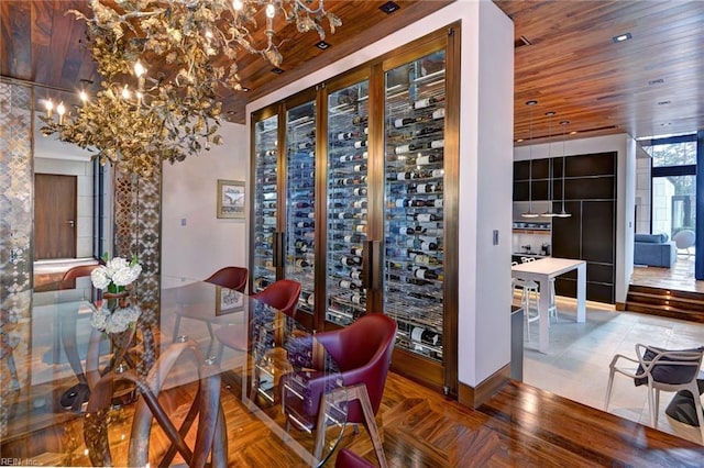 interior space featuring a notable chandelier and wooden ceiling