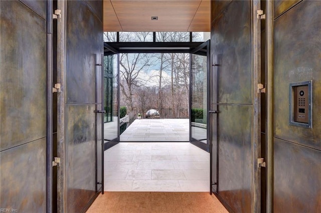 doorway featuring floor to ceiling windows