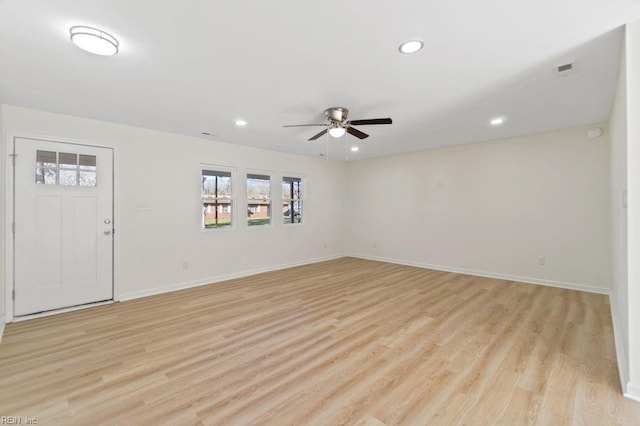 interior space featuring ceiling fan and light wood-type flooring