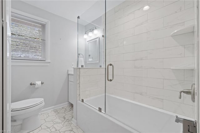 full bathroom with toilet, vanity, and enclosed tub / shower combo