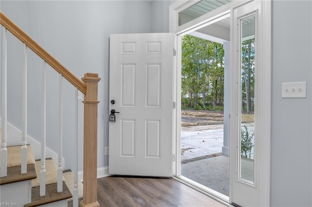 entrance foyer featuring light hardwood / wood-style floors and plenty of natural light